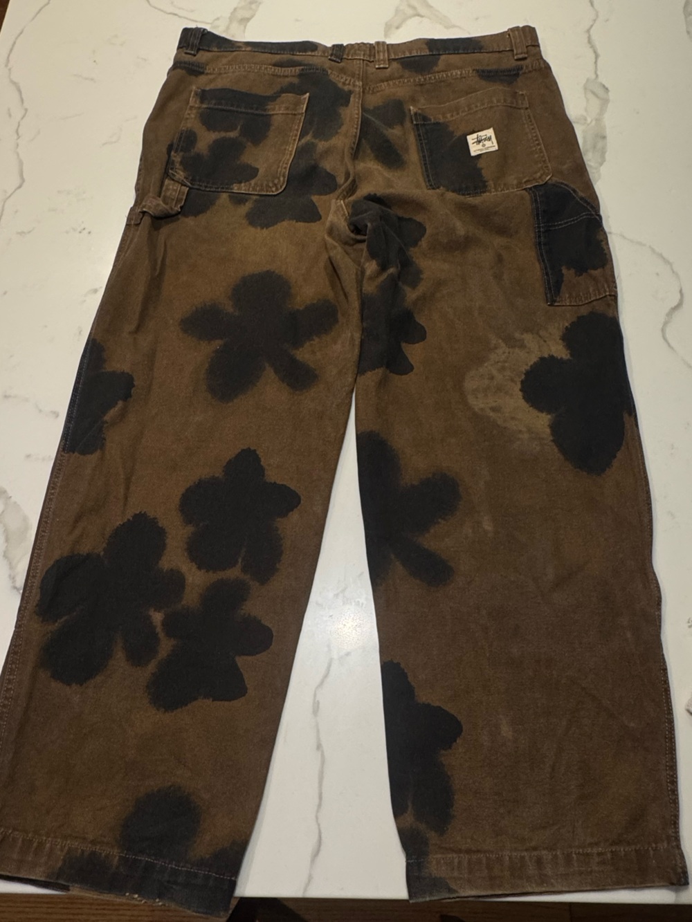 Stussy Brown Relaxed Jeans with Black Floral Print